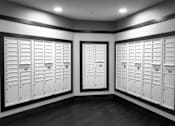 Thumbnail 15 of 81 - A room with two sets of white lockers.
