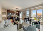 Thumbnail 2 of 100 - Living And Kitchen at The M on Hennepin, Minneapolis, Minnesota