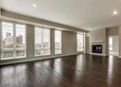 Thumbnail 64 of 100 - Specious bedroom with fireplace at The M on Hennepin, Minneapolis, Minnesota