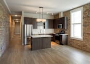 Thumbnail 80 of 100 - Kitchen with large windows at The M on Hennepin, Minneapolis, MN, 55414