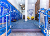 Thumbnail 15 of 20 - A blue railing with a white pole in the middle of a room.