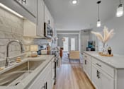 Thumbnail 4 of 67 - Fully Equipped Kitchen at Lochner Apartments, White Bear Lake, 55110