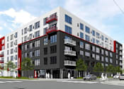 Thumbnail 1 of 47 - A modern multi-story building with a red and black facade and a sign at The Redwell Apartments, Minneapolis, 55401