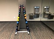 Thumbnail 3 of 47 - A row of vending machines with a row of coloured balls in front of them at The Redwell Apartments, Minneapolis, Minnesota