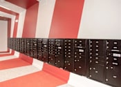Thumbnail 9 of 47 - A long row of mailboxes are lined up on a wall at The Redwell Apartments, Minneapolis, 55401