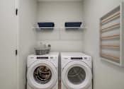 Thumbnail 12 of 36 - Two Front Loading Washing Machines at Peregrine Apartments, Minneapolis, Minnesota