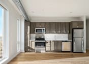 Thumbnail 14 of 36 - Kitchen with a Wooden Floors at Peregrine Apartments, Minneapolis, MN, 55411
