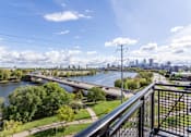 Thumbnail 16 of 36 - A Cityscape with a River at Peregrine Apartments, Minneapolis