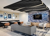 Thumbnail 24 of 36 - Communal Lounge Area at Peregrine Apartments, Minneapolis, 55411
