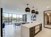 Thumbnail 27 of 36 - Kitchen with a Large Island at Peregrine Apartments, Minneapolis, 55411