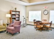 Thumbnail 7 of 29 - library and exercise bike