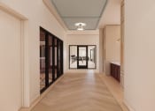 Thumbnail 47 of 49 - a hallway with a door to a closet and a mirror on the wall at Sandhill Parkway Townhomes Apartments, East Bethel