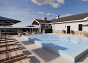 Thumbnail 21 of 49 - A large swimming pool in front of a house.