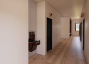 Thumbnail 48 of 49 - a hallway with white walls and wooden floors and a fireplace at Sandhill Parkway Townhomes Apartments, East Bethel, Minnesota