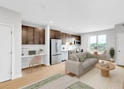 Thumbnail 98 of 110 - A modern living room with a couch, coffee table, and kitchen area.