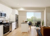 Thumbnail 59 of 105 - a kitchen and living room in a 555 waverly unit at The Gateway at West Lake Quarter in Minneapolis, MN