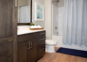 Thumbnail 36 of 60 - Bathroom With Shower at The McMillan Apartments in Shoreview, MN 55126