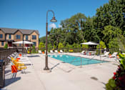 Thumbnail 16 of 60 - Relaxing Pool Area With Sundeck at The McMillan, Shoreview, MN, 55126