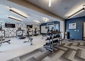 Thumbnail 26 of 91 - a fitness center with treadmills and other exercise equipment at The Morrison, Minnesota