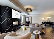 Thumbnail 38 of 91 - a living room filled with furniture and a fire place at The Morrison, Minnesota, 55068