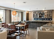 Thumbnail 47 of 60 - Community Lounge at The McMillan Apartments in Shoreview, MN 55126