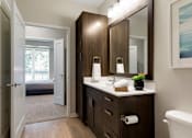 Thumbnail 35 of 60 - Master Bathroom Vanity at The McMillan Apartments in Shoreview, MN 55126