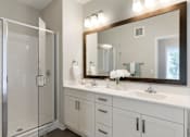 Thumbnail 44 of 60 - Master Bathroom Vanity at The McMillan Apartments in Shoreview, MN 55126