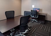 Thumbnail 17 of 26 - Business Center with computer and meeting table