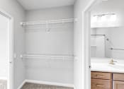 Thumbnail 42 of 97 - A white bathroom with a walk-in shower and a sink.
