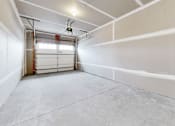 Thumbnail 13 of 97 - A large empty room with a door on the left side.