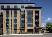 Thumbnail 67 of 69 - A large brick building with the word "Wilford" on the front.