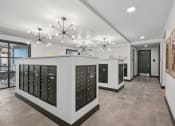 Thumbnail 89 of 105 - the tasting room has a wall of wine cabinets and a long hallway with a door