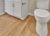 Thumbnail 77 of 105 - a bathroom with a toilet sink and mirror