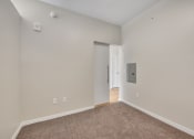 Thumbnail 74 of 105 - a bedroom with grey carpet and white walls