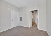 Thumbnail 68 of 105 - a bedroom with grey carpet and white walls