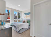 Thumbnail 21 of 105 - a bedroom with a large bed in a house