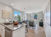Thumbnail 14 of 105 - a kitchen and living room with a view of a construction site