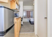Thumbnail 21 of 23 - A Kitchen With a Refrigerator at Atrium Garden Apartment Homes, LLC, California, 95112