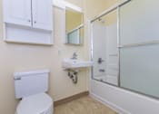 Thumbnail 23 of 23 - A White Toilet Sit at Atrium Garden Apartment Homes, LLC, San Jose, CA