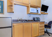 Thumbnail 8 of 23 - A Kitchen With a Fridge at Atrium Garden Apartment Homes, LLC, California, 95112