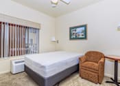Thumbnail 20 of 23 - A Bedroom With a Painting On The Wall at Atrium Garden Apartment Homes, LLC, San Jose