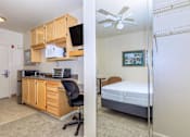 Thumbnail 16 of 23 - A Bedroom With a Bed at Atrium Garden Apartment Homes, LLC, San Jose, CA, 95112