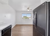 Thumbnail 39 of 45 - Kitchen with refrigerator at Ocean Villas Apartments, Oxnard, 93033