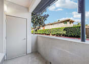 Thumbnail 27 of 60 - A white door is on the left side of the image.