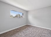 Thumbnail 33 of 45 - Spacious room with oversized window at Ocean Villas Apartments, Oxnard, California