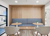 Thumbnail 17 of 45 - Table with Chairs at Ocean Villas Apartments, California