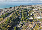 Thumbnail 24 of 47 - A bird's eye view of a residential area with a road running through it. at Skyline Heights Apartments, Daly City, 94015