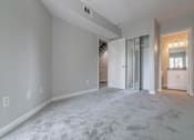 Thumbnail 16 of 23 - a room with a carpet with different colored lights on it at Warner Center Townhomes, Canoga Park