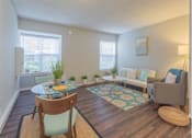 Thumbnail 1 of 47 - a living room with a couch and a table at Skyline Heights Apartments, California, 94015