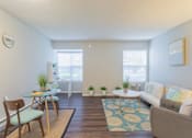 Thumbnail 2 of 47 - a living room with a couch and a table at Skyline Heights Apartments, California